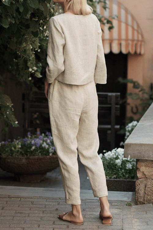 Woman wearing relaxed cotton-linen monochrome longline top and wide-leg pants set outdoors