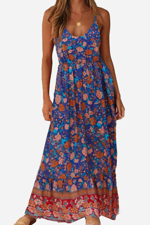 Woman wearing a blue vintage flower prints casual maxi dress with spaghetti straps and elastic waist