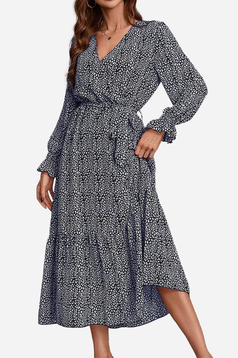 Bloom Wrap Midi Dress in comfortable chiffon with floral print, A-line silhouette, and long trumpet sleeves.