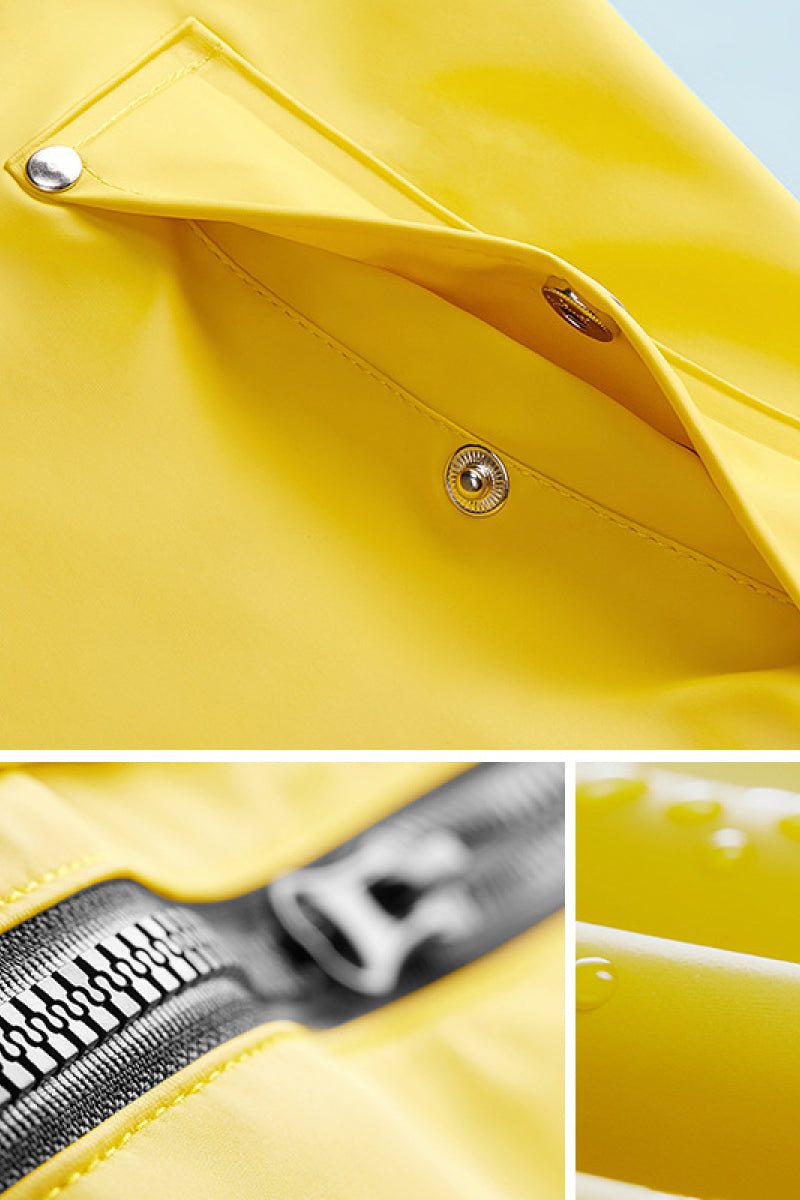 Close-up of yellow lightweight ultra water-resistant windbreaker jacket details with button, zipper, and water droplets on PVC-coated polyester fabric