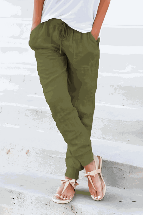 Relaxed Chic Elastic Ankles Pants in olive green with tapered fit and elastic cuffs worn with white top and sandals