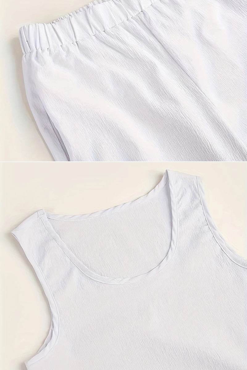 White sleeveless top and elastic waist pants set designed to balance apple-shaped body silhouette