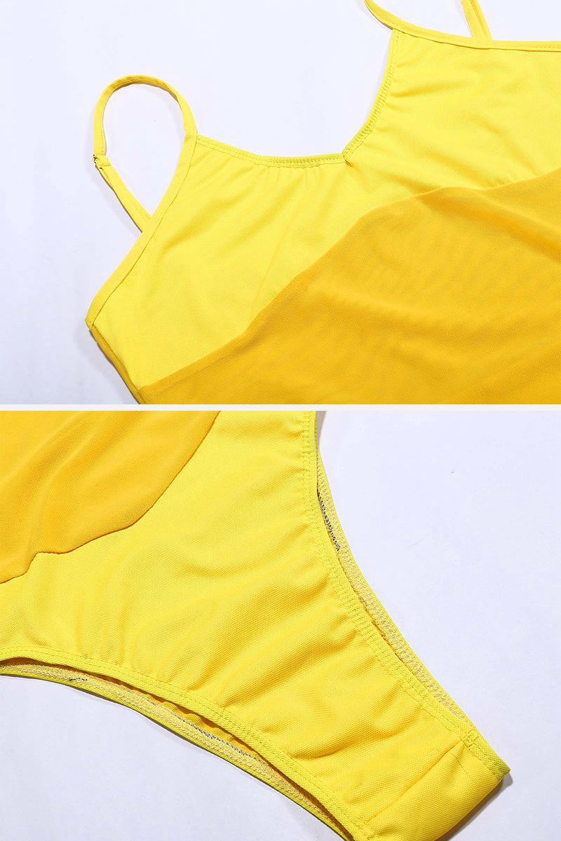 Close-up of yellow mesh tan-through one piece swimsuit fabric and stitching details