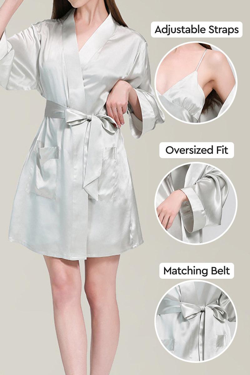 Woman wearing a white Mulberry silk nighty and robe set with adjustable straps, oversized fit, and matching belt