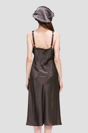 Back view of a woman wearing a brown Mulberry Silk Elegant Night Dress and matching silk cap