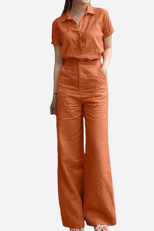 Women's linen-look set in rust color, breathable, comfortable loungewear with stylish wide-leg pants and short-sleeve collared top.