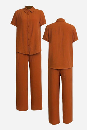 Brown breathable linen-look set with short-sleeve button-up top and wide-leg pants, styled for comfort and versatility.