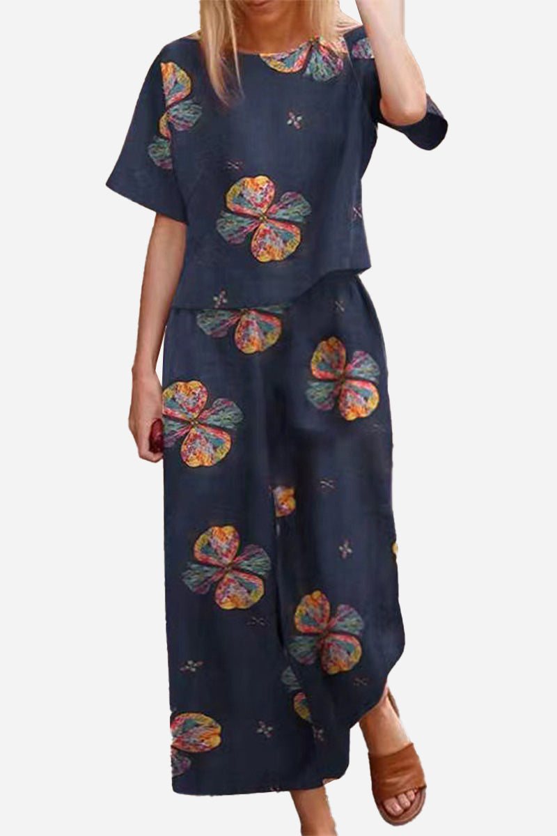 Linen and cotton loose two-piece set with floral print, short sleeves top, and wide-leg pants in navy blue