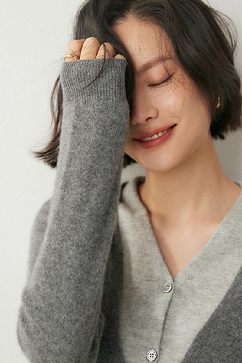woman wearing gray single-breasted cashmere wool cardigan with relaxed fit