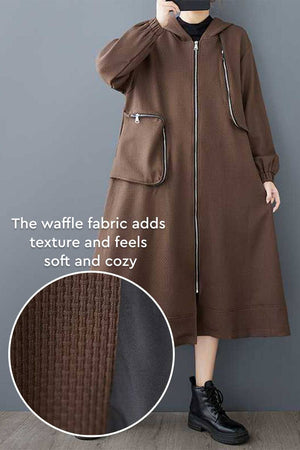 Brown oversized ZipLine Oversized Long Coat with waffle textured fabric and large zippered pockets