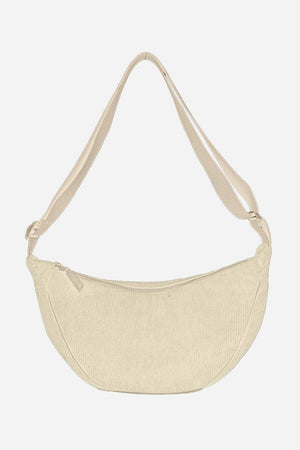 Beige corduroy shoulder bag with adjustable strap and zip closure, lightweight and roomy design.