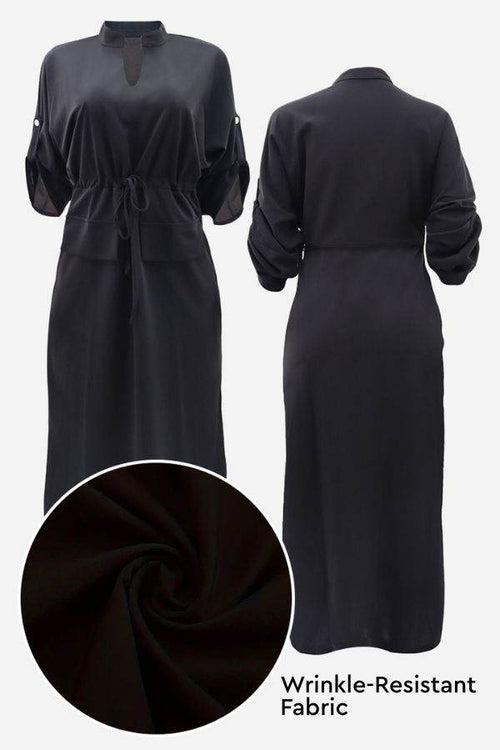 Black All-Day Drape Dress with adjustable waist tie, front slit, breathable wrinkle-resistant fabric, and roll-up sleeves.
