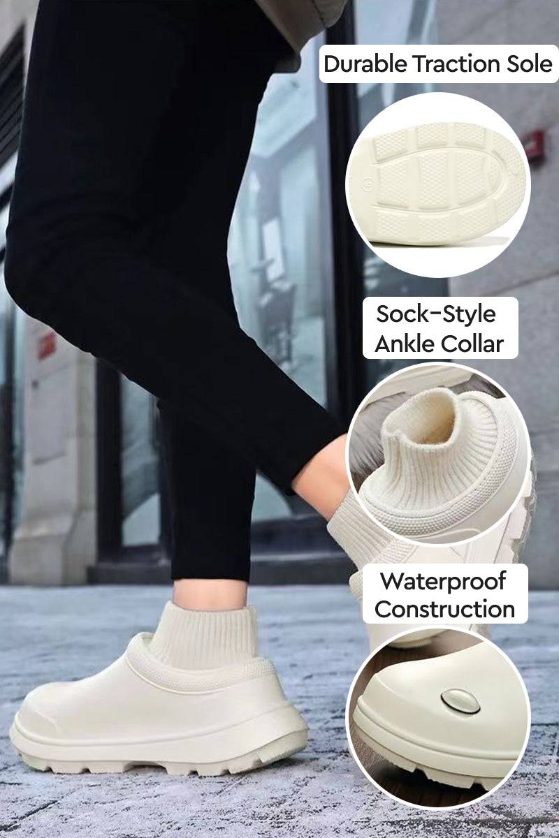 Fleece-lined comfort clogs with waterproof construction, sock-style ankle collar, and durable traction sole for all-weather wear