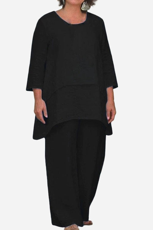Black loose drape two-piece set with oversized top and wide-leg pants, breathable polyester-spandex blend for stylish comfort.