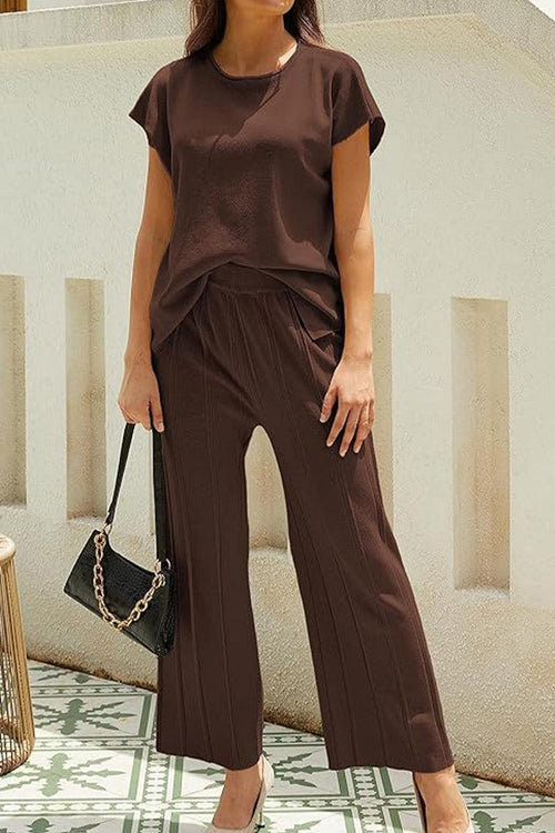 First Class Travel two-piece set in brown, lightweight pleated top and wide-leg pants for stylish travel comfort
