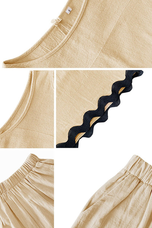 Close-up details of Flattering Coastal Scallop two-piece set in soft beige viscose fabric with scalloped hem and elastic waistband