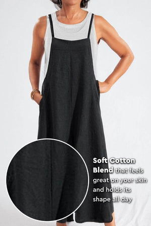 Woman wearing black cotton blend comfort jumpsuit with wide-leg design and sleeveless cut