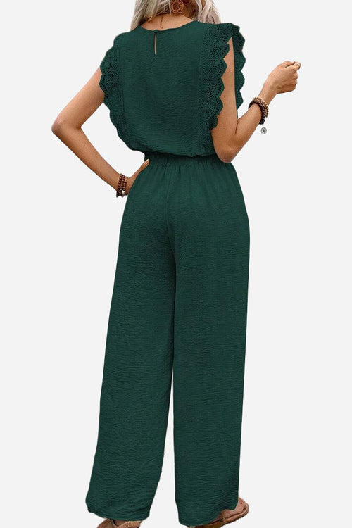 Elegant two-piece set in dark green with lace detail and relaxed fit, perfect for comfortable stylish wear.