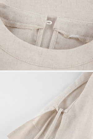 Close-up of breathable cotton-linen fabric texture and button loop detail on beige two-piece set