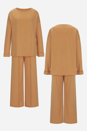 Camel-colored comfortable travel-ready two-piece set with relaxed top and wide-leg pants, wrinkle-resistant fabric