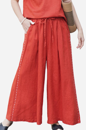 Red wide-leg pants made of 100% linen with elastic waist and one size fits all design