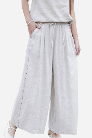 100% linen wide-leg pants with elastic waist and relaxed fit for all-day comfort and breathability