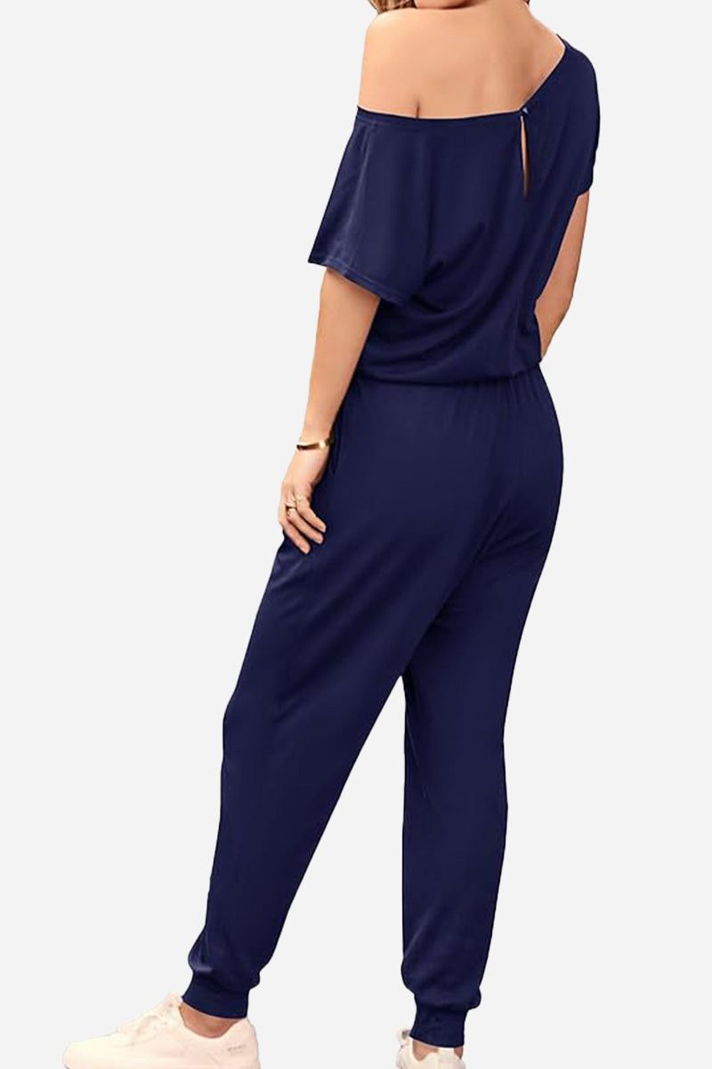 Moonlit Rome Off-Shoulder navy jumpsuit with oblique neckline and tapered legs