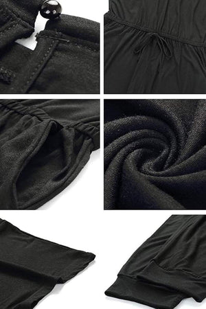 Close-up details of black Moonlit Rome Off-Shoulder Jumpsuit fabric and design features