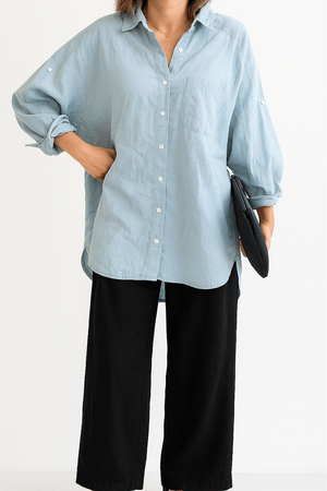 Light blue linen-cotton blend relaxed shirt with black high-waist palazzo pants from Linen Breeze Set summer outfit.