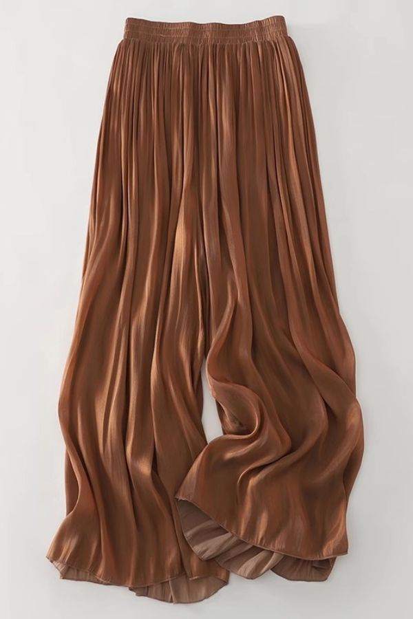 Garden Soirée cotton-silk blend wide-leg pleated trousers in brown with elastic waistband and elegant drape.