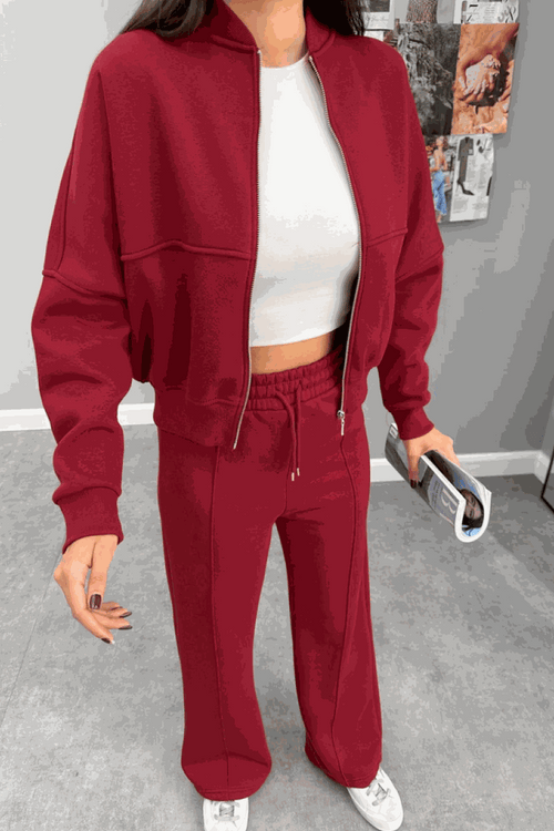 The Voyager Zip Set in red zip-front sweatshirt and wide-leg joggers travel outfit