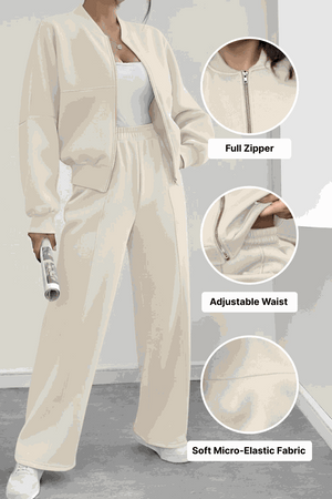 The Voyager Zip Set cream zip-front sweatshirt and wide-leg joggers with adjustable waist and soft micro-elastic fabric for comfortable travel and versatile style