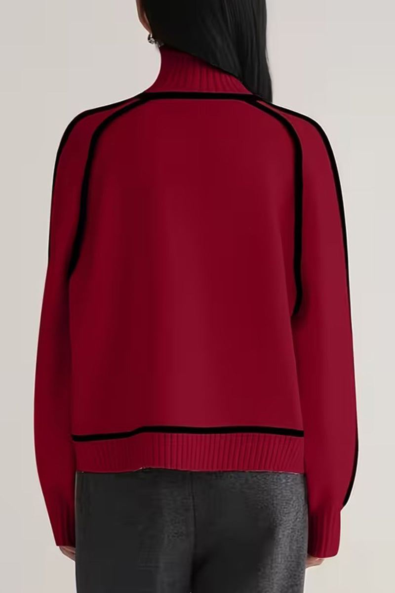 Back view of red Zero Itch Turtleneck Sweater with black contrast trim and relaxed fit on model