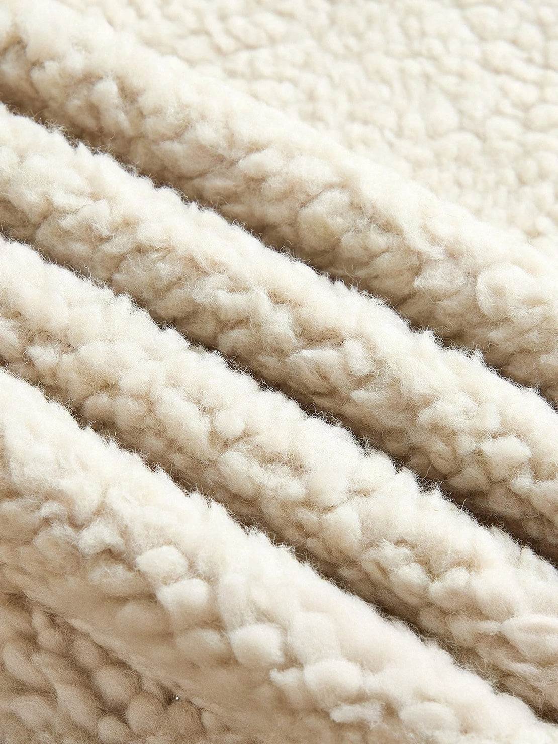 mid-thigh faux suede sherpa coat with contrast trim and side pockets for transitional weather