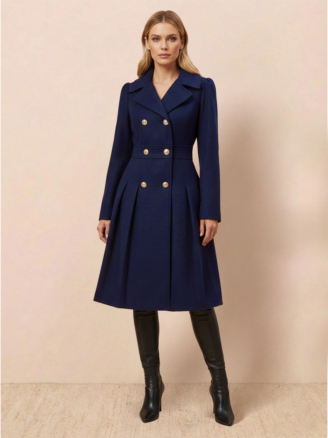 Tailored fit and flare trench coat with double-breasted buttons and pleated hem