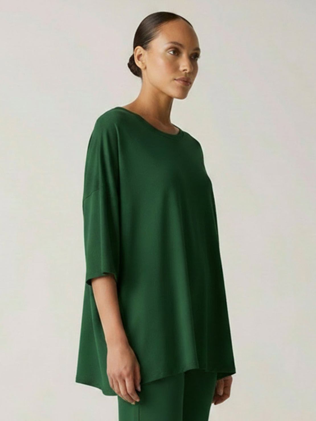 Oversized long-line loungewear set with short-sleeve pullover and wide-leg pants in soft knit fabric