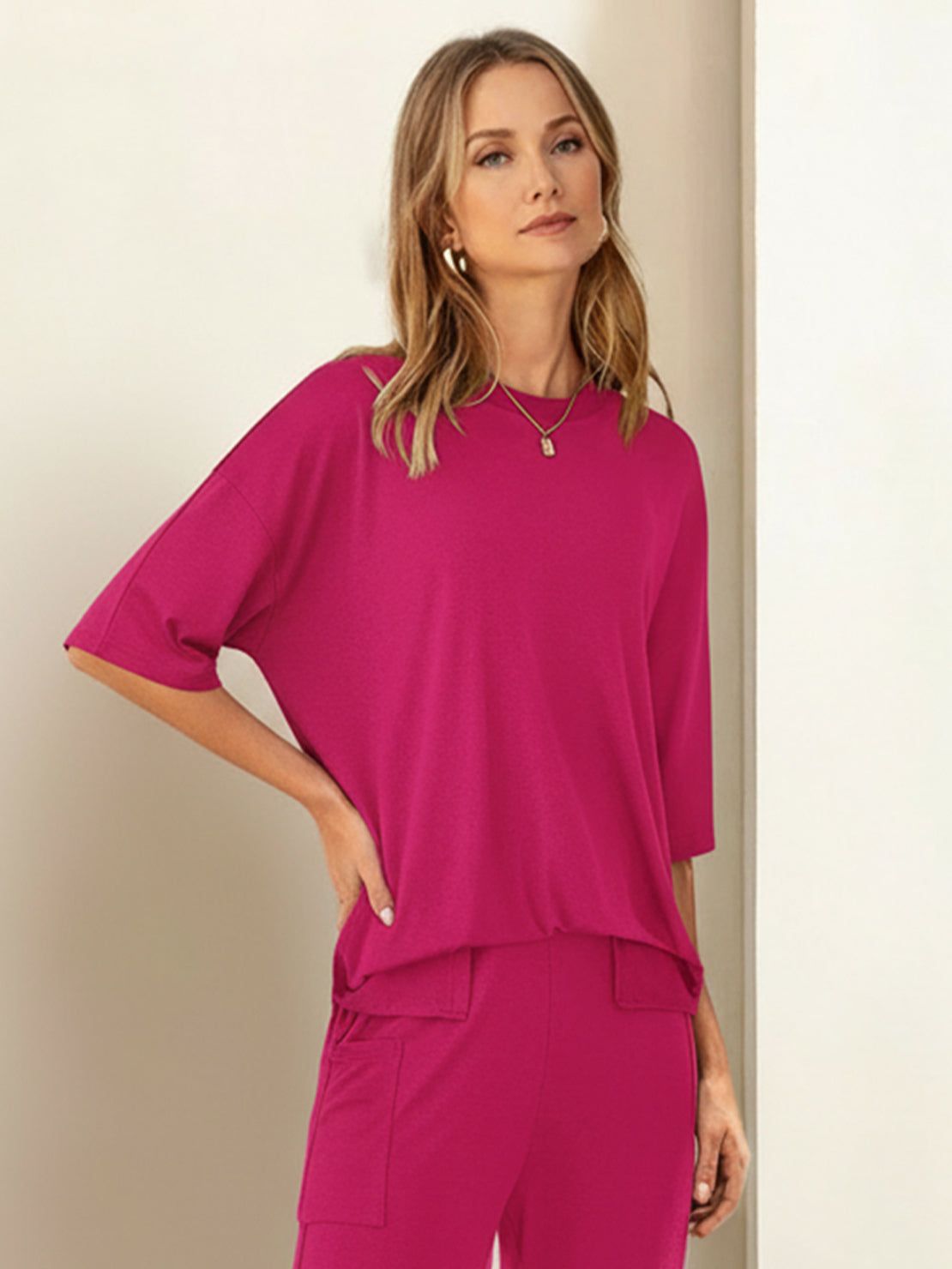 Oversized long-line loungewear set with short-sleeve pullover and wide-leg pants in soft knit fabric