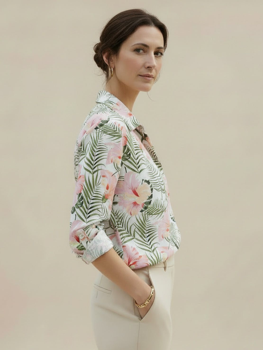 Floral button-down shirt with long roll-up sleeves and relaxed hip-length fit