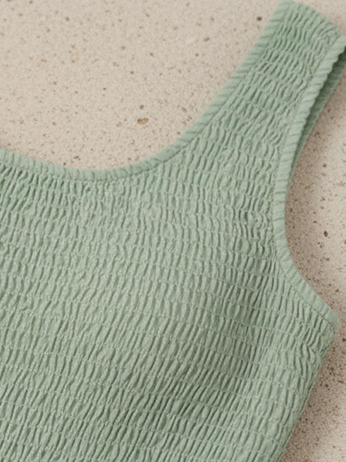 Smocked sleeveless maxi dress with tiered skirt and scoop neckline