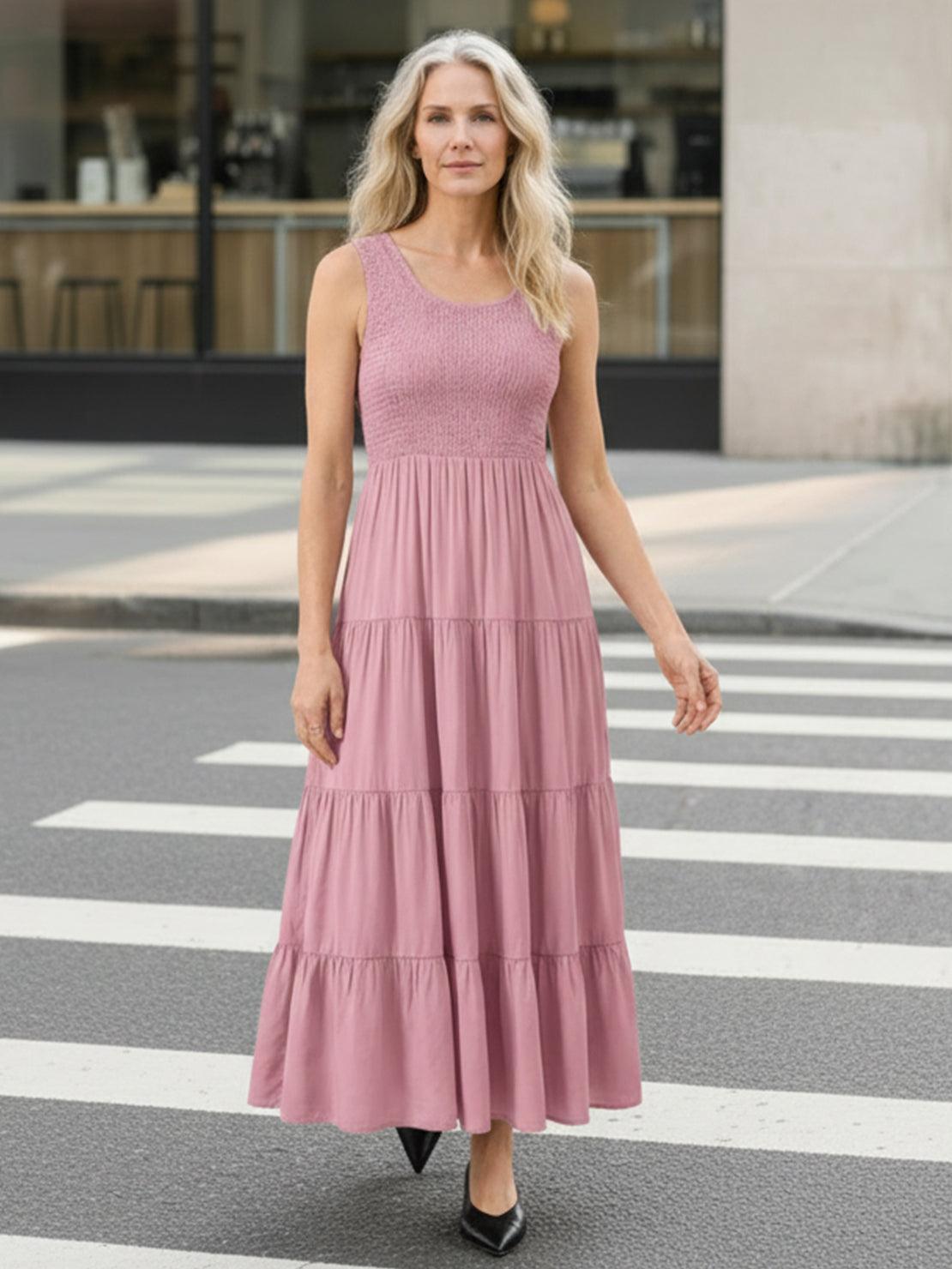 Smocked sleeveless maxi dress with tiered skirt and breathable fabric