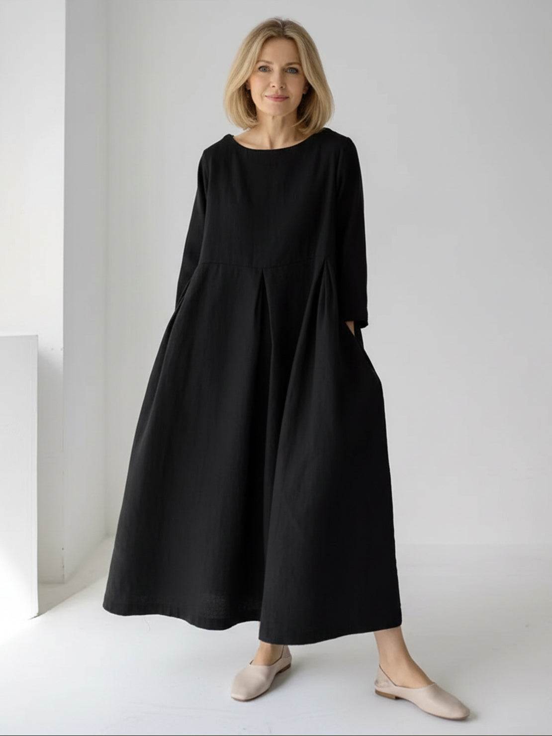 Cotton-linen empire waist dress with natural crinkle texture and deep side pockets