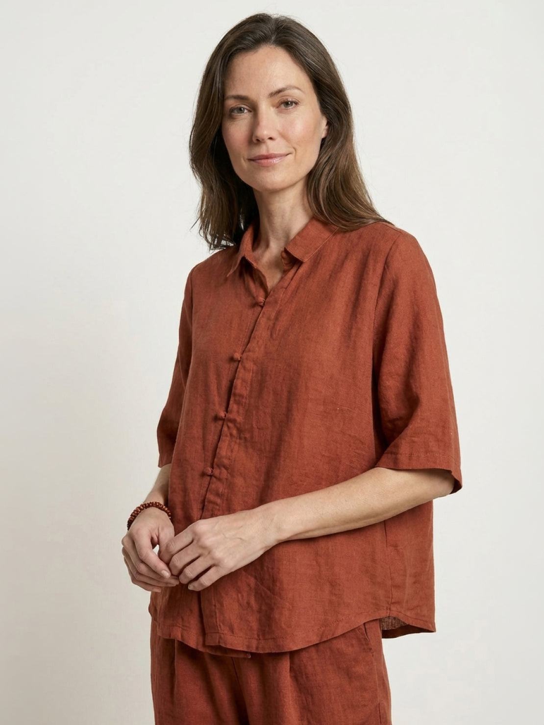 100% cotton artisan two-piece set with oversized button-front shirt and wide-leg pants in natural crinkle texture