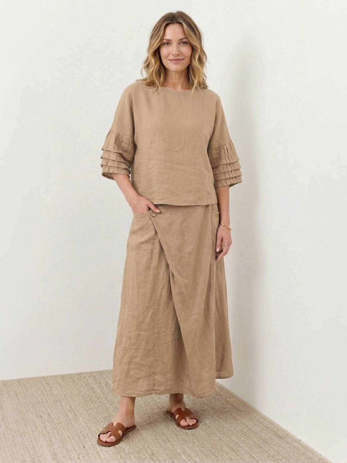 woman wearing 100% cotton wrap skirt two-piece set with crinkle texture and wrap-front maxi skirt
