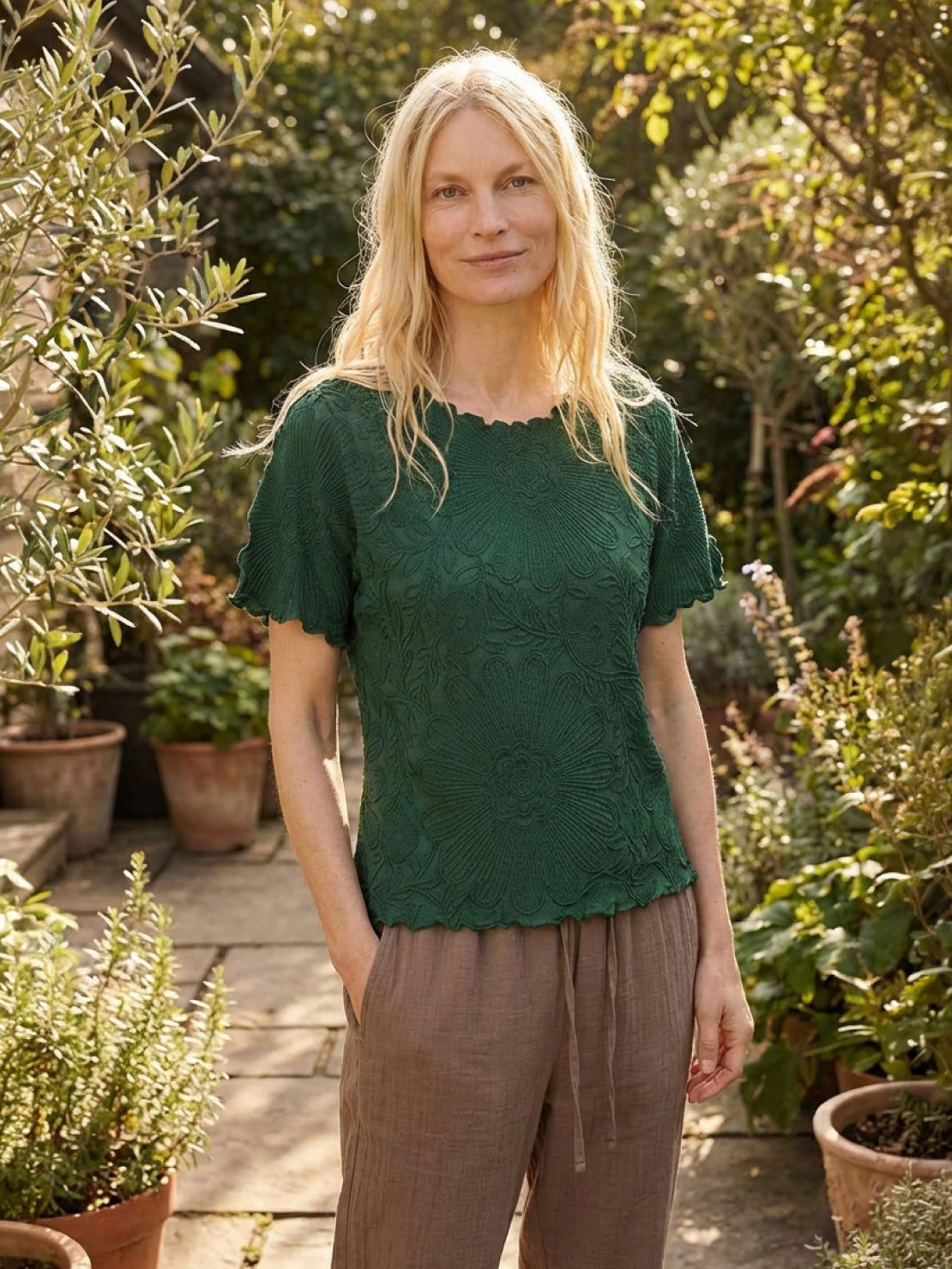 Floral Jacquard Pleated Top with 3D floral texture and flutter sleeves in relaxed A-line silhouette