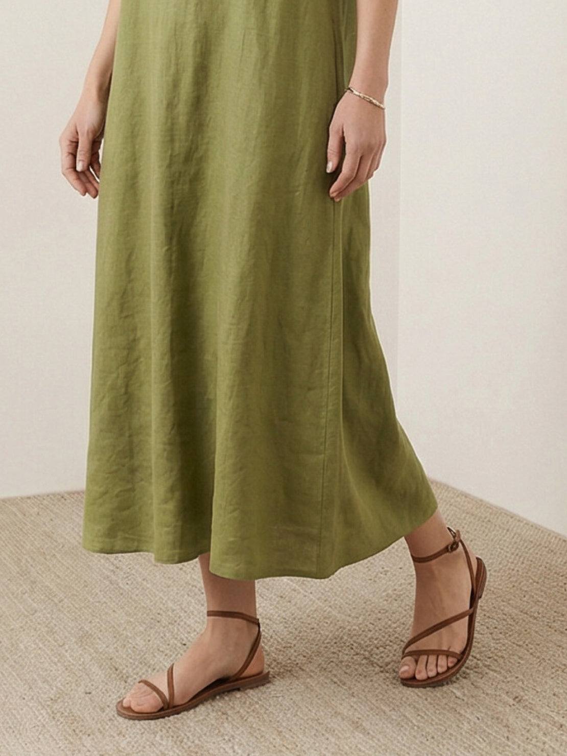 Lightweight cotton linen sleeveless maxi dress with round neckline and flowing ankle-length silhouette