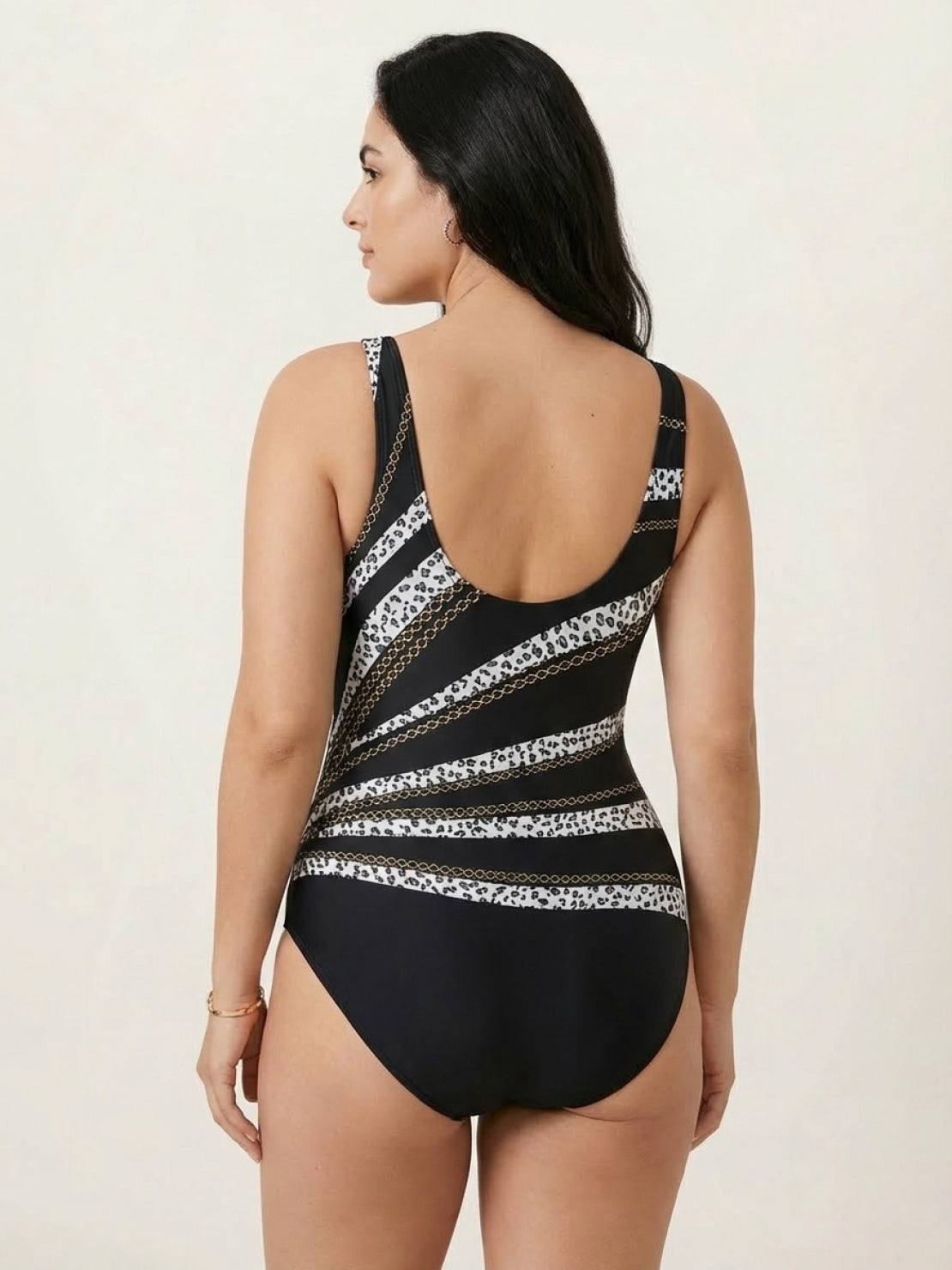 Curve-Fit open-back swimsuit with scoop front, adjustable straps, and diagonal back panels for structured fit