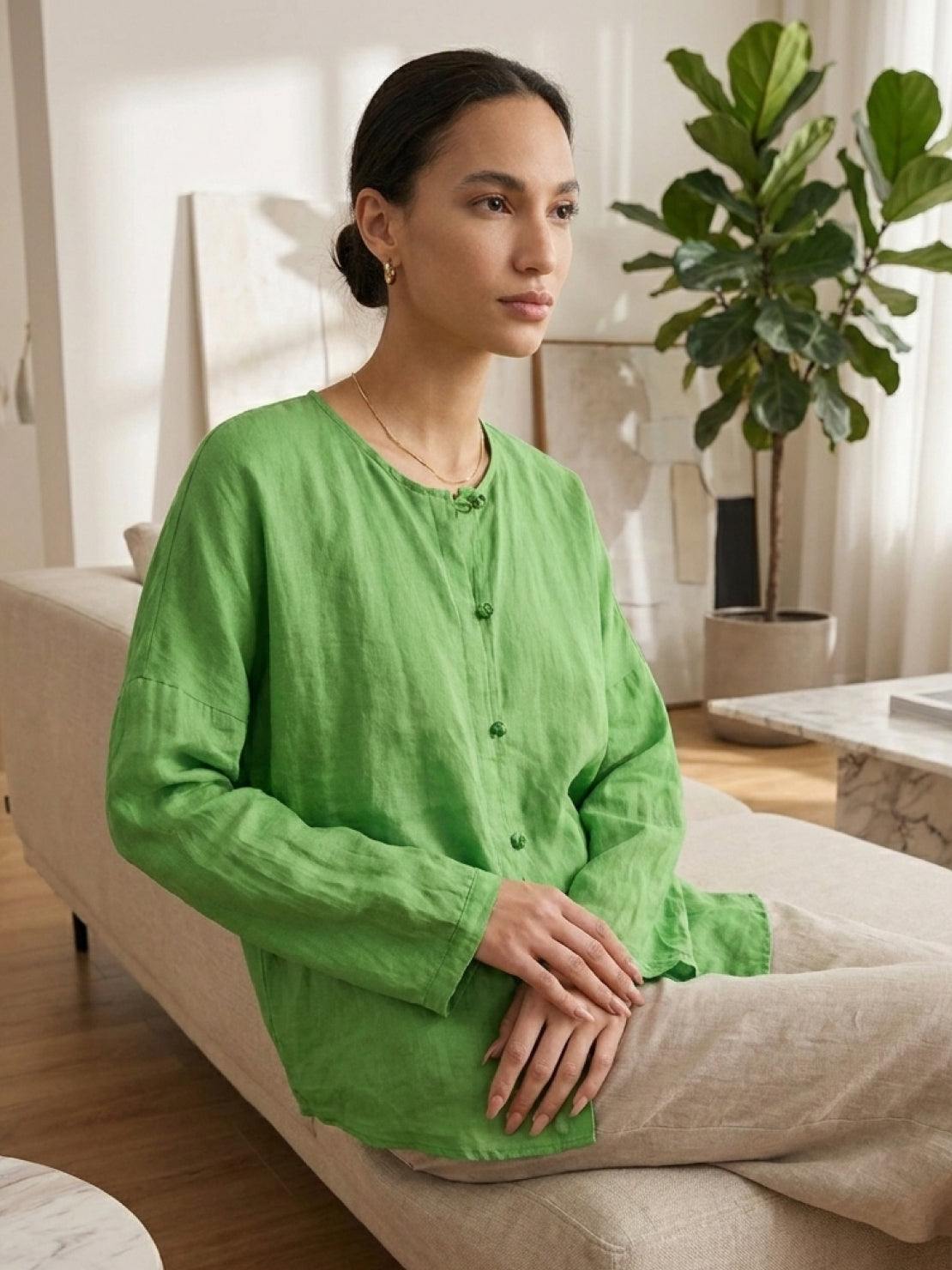 Oversized 100% linen blouse with frog-button closure and curved hem in lightweight, semi-sheer fabric