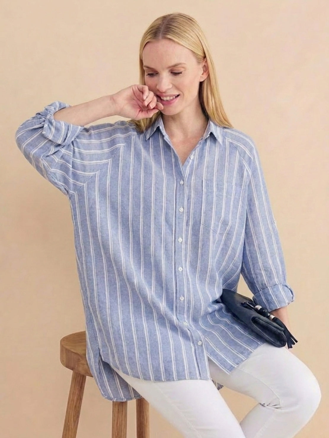 Relaxed oversized 100% cotton linen shirt with back pleat and button-up design