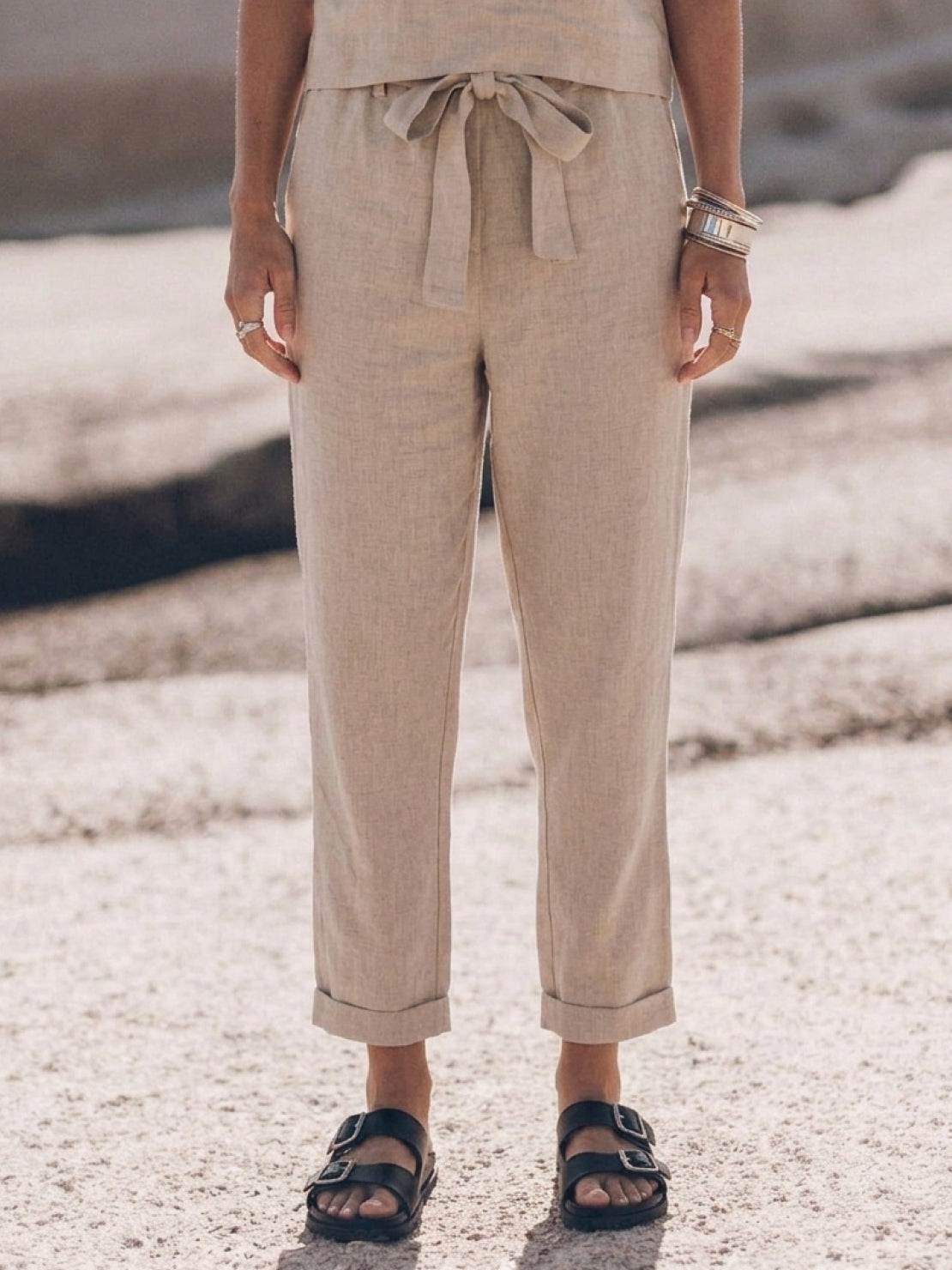 woman wearing cotton-linen monochrome relaxed longline top and wide-leg pants set