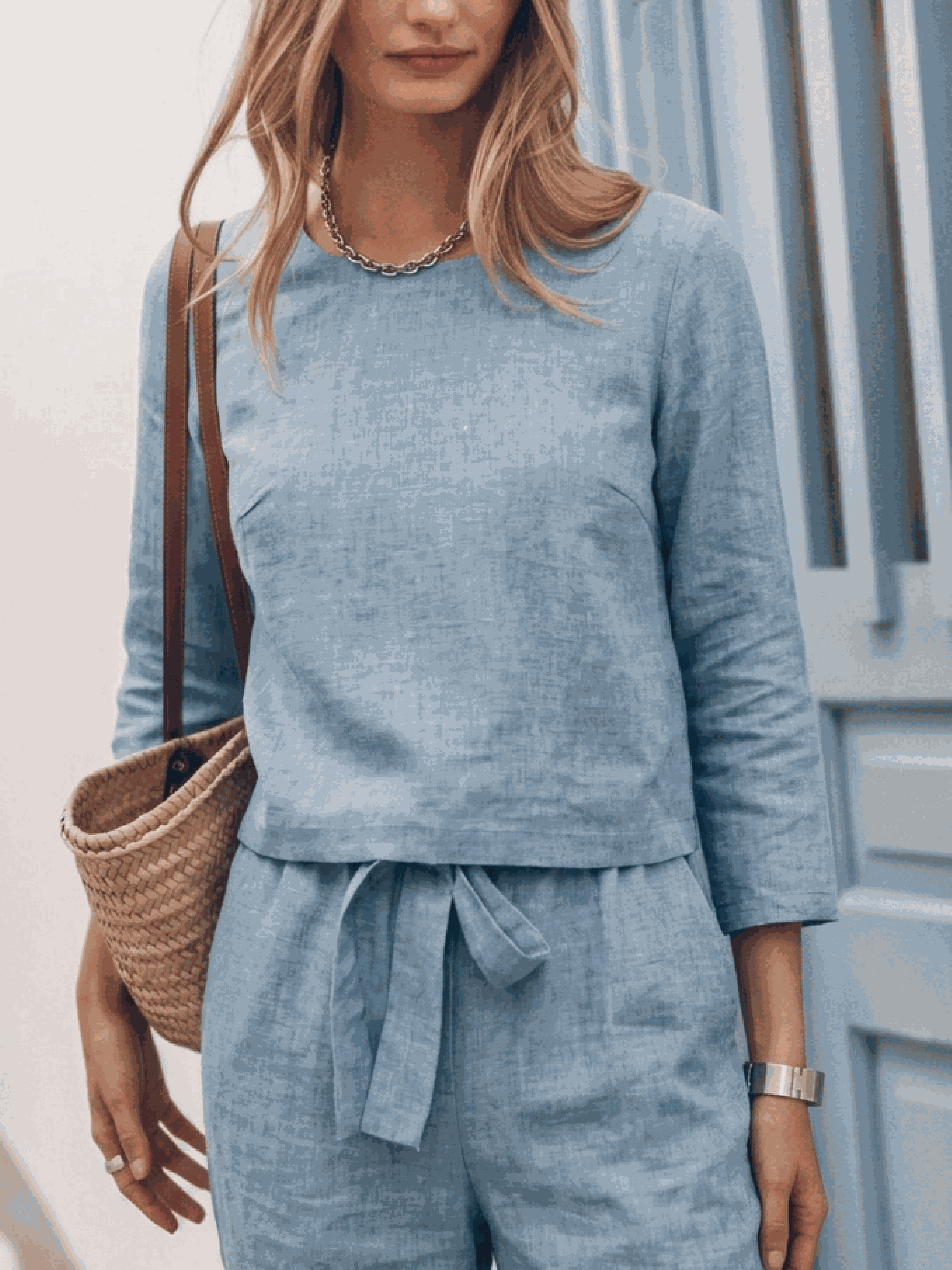 woman wearing relaxed cotton-linen set with short sleeves and straight-leg pants in soft textured fabric